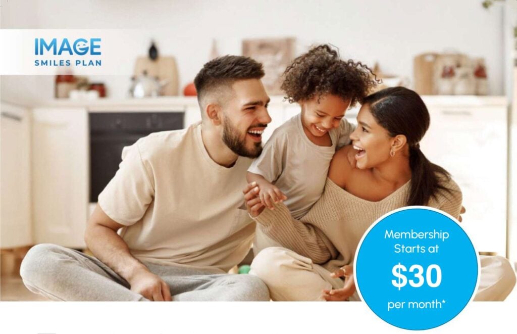 A smiling family of three sits on the floor in a kitchen. Text on the image promotes a dental plan with memberships starting at $30 per month.